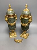 A modern pair of gilt metal and marble urns32cm