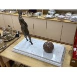 An Art Deco style bronze lady and a marble sphere, on marble base, length 76cm