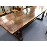 An 18th century style oak refectory dining table, length 274cm, width 94cm, height 72cm