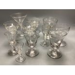 A small collection of late 18th/19th century divinity glasses, some with air twist stems, tallest