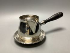 A Canadian white metal sterling brandy pan on stand, height 9.3 cm,gross 13.5 oz.