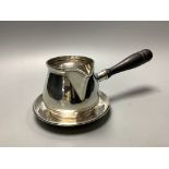 A Canadian white metal sterling brandy pan on stand, height 9.3 cm,gross 13.5 oz.