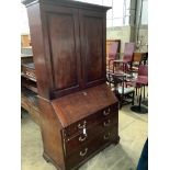 A George III mahogany bureau cabinet, width 114cm, depth 58cm, height 222cm