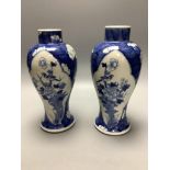 A pair of Chinese blue and white vases, Kangxi mark c.1900, height 22.5cm