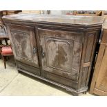 A Dutch oak two door cabinet, width 170cm, depth 60cm, height 124cm