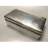 A 1930s silver rectangular cigarette box with engraved inscription, length 20.3 cm,Sheffield,