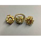 A yellow metal and cat's eye chrysoberyl? cluster ring and a pair of similar earrings,ring size M,