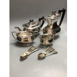 A four piece plated tea set and plated teaspoons.