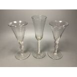 A George III double series opaque twist ale glass and pair of George III style air twist wine