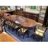 A 20th century Chinese carved hardwood dining room suite comprising sideboard fitted with four