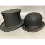 A collapsable top hat and a bowler riding hat