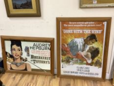 Two framed film posters: Breakfast and Tiffanys and Gone with The Wind