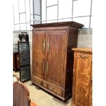 A Louis XV French provincial elm armoire, width 182.9cm depth 56cm height 300cm