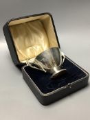 A cased Art Deco silver two handled christening bowl, Atkins Bros, Sheffield 1931, height 10 cm, 244