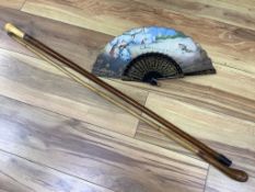 Two walking sticks, one with marine ivory handle and a painted fan