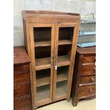 A continental fruitwood glazed cabinet, width 72cm, depth 34cm, height 165cm