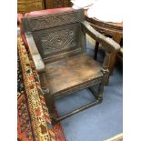An oak wainscot chair, width 59cm, depth 50cm, height 86cm