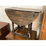 An early oak gateleg occasional table, width 60cm, depth 29cm, height 53cm