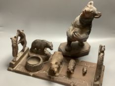 A collection of Black Forest carvings - a bookslide, an ashtray and four bears
