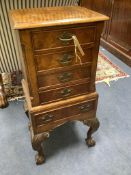 An 18th century style figural walnut small chest with five drawers, width 36cm, depth 30cm, height