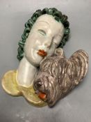 A Goldscheider portrait wall mask depicting a lady and her dog, length 25cm