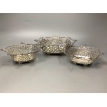An Edwardian graduated set of three pierced silver shaped rectangular bonbon dishes by William