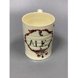 A creamware ‘ALE’ mug, c.1780, height 9.5cm