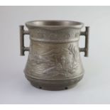 A Japanese archaistic bronze two-handled vessel, Meiji periodcast in high relief with men hanging