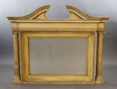 A Victorian Adam style cream painted beech overmantel,with broken arch cornice and central bevelled