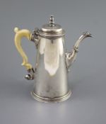 A George II silver coffee pot, by Robert Lucas,of tapering cylindrical form, with ivory handle,