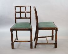A set of ten early 20th century oak and beech dining chairs,with cross frame backs and drop in