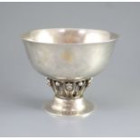 A 1920's George Jensen planished sterling silver pedestal bowl,design no. 197A, with pierced leaf