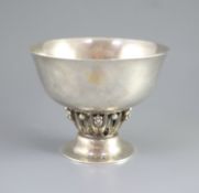A 1920's George Jensen planished sterling silver pedestal bowl,design no. 197A, with pierced leaf
