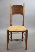 A set of six oak chairs, including a pair of carvers, in the Glasgow School manner by William