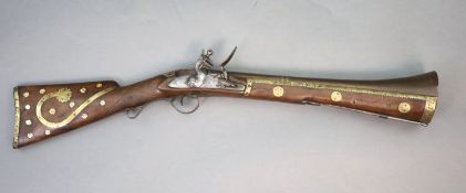 An early 19th century Indian flintlock blunderbuss, East India Company,the barrel with remnants of