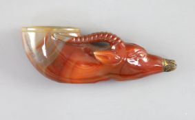 A Chinese chalcedony 'antelope' rhyton, late Qing dynasty,the mouth of the antelope with applied