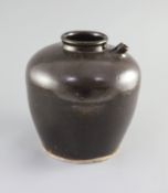 A Chinese Henan wine jar, Song-Yuan dynasty,covered in a dark brown glaze, with single spout,23.5cm