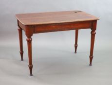 A Victorian mahogany writing table,with rounded rectangular top, once fitted with an inkwell, on