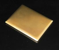 A 1950's Garrard & Co engine turned 9ct gold cigarette case,with interior engraved inscription, 11.