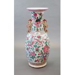 A massive Chinese famille rose 'dragon and phoenix' vase, 20th century,painted with dragons and