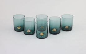Royal Interest, a set of six 1960’s turquoise glass tumblers,each bearing an applied badge