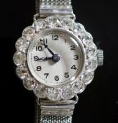 A lady's platinum and diamond set manual wind cocktail watch, on an 18ct white gold mesh link