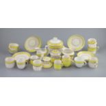 A group of Derby yellow ground tea and coffee wares and a chamberstick, c.1790-1800,the sucrier and