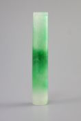A Chinese jadeite official's hat plume holder,the ice white stone with emerald green inclusions,7cm