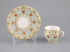 A Royal Worcester 'jewelled' and reticulated cup and saucer, c.1870,decorated with raised jewelling