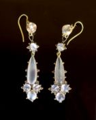 A pair of early 20th century gold and six stone cabochon moonstone set drop earrings,with sphere
