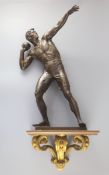 After Robert Cauer (1863-1947) a bronze figure of a shot-putter, c.1925,height 40cm, together with