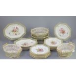 A Berlin porcelain dessert service, mid 19th century,each piece of octagonal shape, painted with