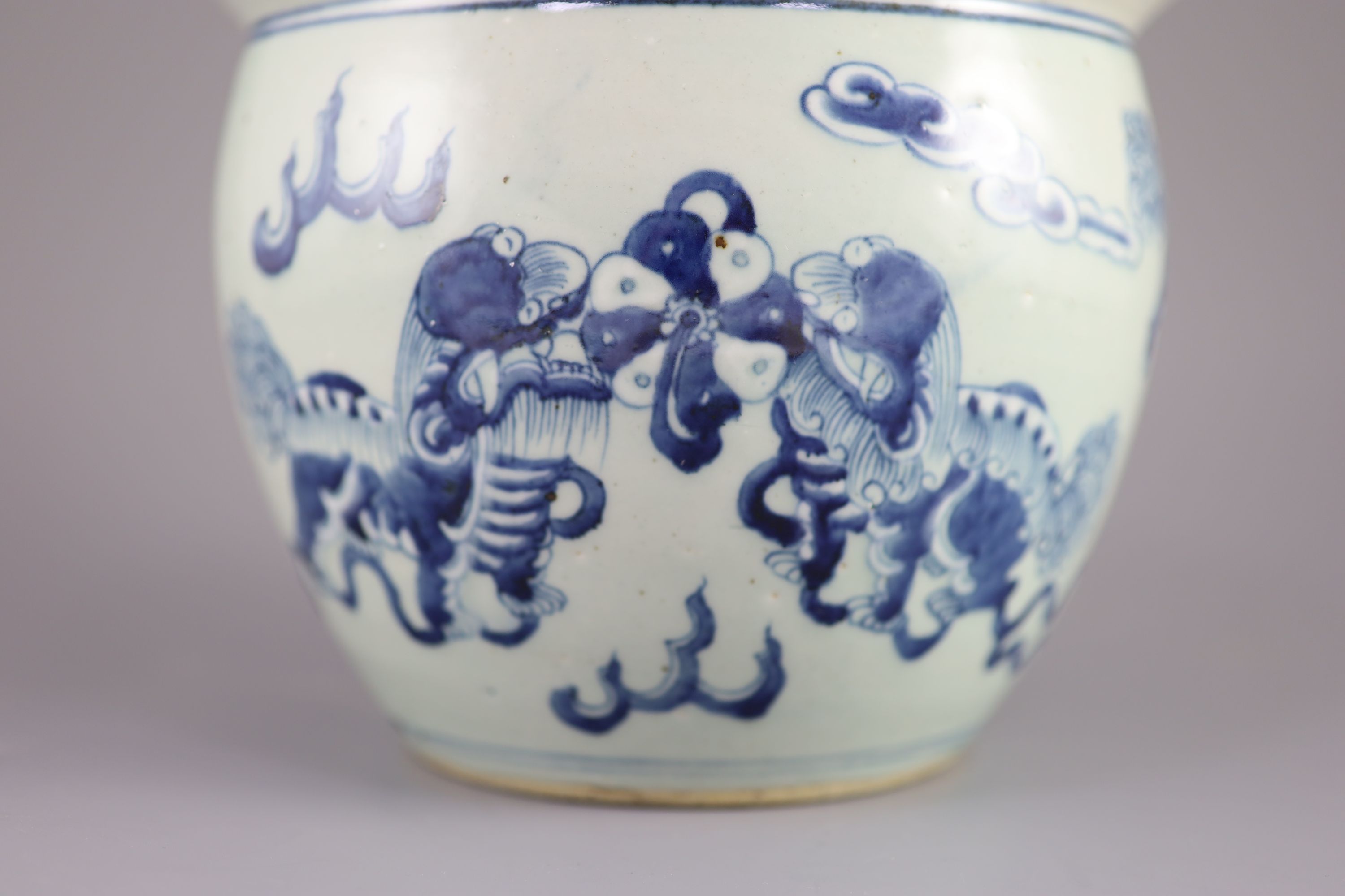 A Chinese blue and white 'lion-dog' flower pot,painted with lion-dogs on white slip, on a pale - Image 2 of 6