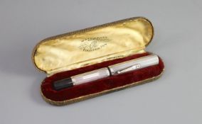 A rare giant Waterman's 58 Ideal silver overlaid fountain pen,engine-turned with hallmarks for